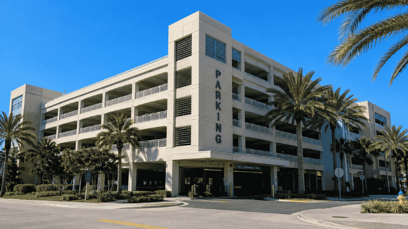 North Beach Parking Plaza garage at Clearwater Beach Florida surrounded by palm trees