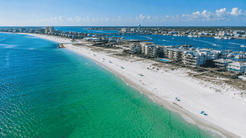 Aerial view of Destin Florida Emerald Coast with sugar white sand beach and emerald green Gulf water