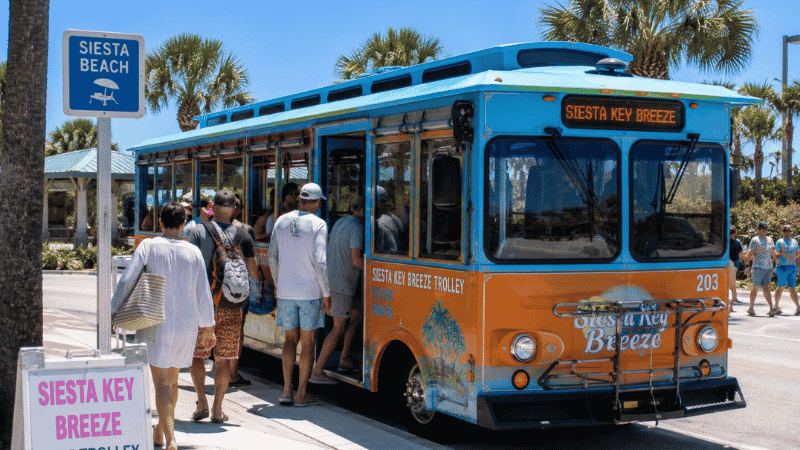 Siesta Key Breeze Trolley free beach bus at a stop in Siesta Key Florida