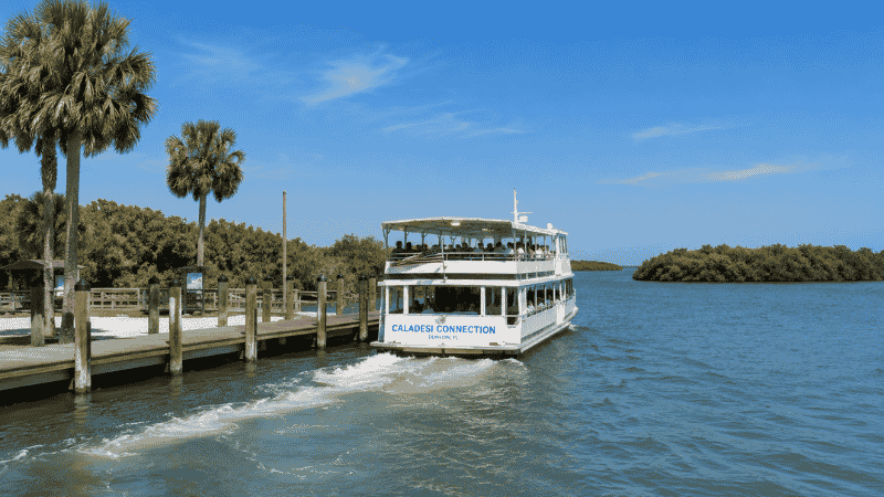 Ferry boat departing from Honeymoon Island State Park dock heading to Caladesi Island Florida