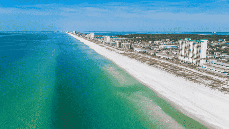Aerial view of Panama City Beach Florida with white sugar sand and emerald green Gulf water